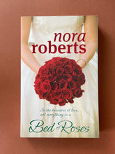 Load image into Gallery viewer, Bed of Roses by Nora Roberts: photo of the front cover which shows very minor scuff marks and creasing along the edges.
