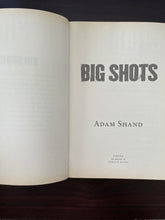 Load image into Gallery viewer, Big Shots by Adam Shand book: photo of the first and title pages, which both have very minor, faint, discolouring around the edges. This same discolouring is also visible on other pages throughout the book.
