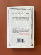 Load image into Gallery viewer, Black Dragon River by Dominic Ziegler: photo of the back cover which shows very minor scuff marks along the edges of the dust cover.
