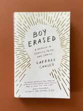Load image into Gallery viewer, Boy Erased by Garrard Conley: photo of the front cover which shows minor creasing running down the left side, parallel to the spine.
