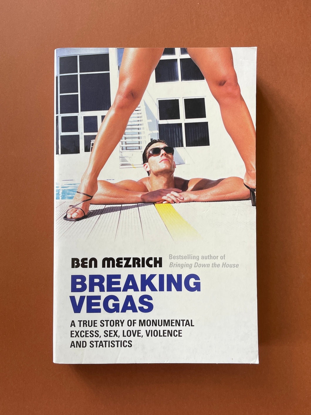 Breaking Vegas by Ben Mezrich: photo of the front cover which shows very minor scuff marks along the edges.