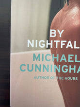 Load image into Gallery viewer, By Nightfall by Michael Cunningham book: photo of the crease that runs from top to bottom of the front cover.
