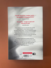 Load image into Gallery viewer, Dark in Death by J. D. Robb: photo of the back cover which shows very minor (barely visible) scuff marks along the edges.
