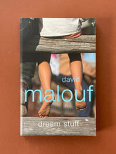 Load image into Gallery viewer, Dream Stuff by David Malouf: photo of the front cover which shows very minor scuff marks along the edges, and minor creasing running down the left side of the cover, parallel to the spine.
