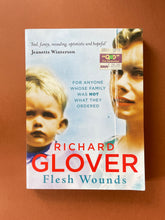 Load image into Gallery viewer, Flesh Wounds by Richard Glover: photo of the front cover which shows very minor scuff marks and obvious creasing along the edges.
