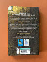 Load image into Gallery viewer, Heart of the Sea by Nora Roberts: photo of the back cover which shows very minor scuff marks along the edges.
