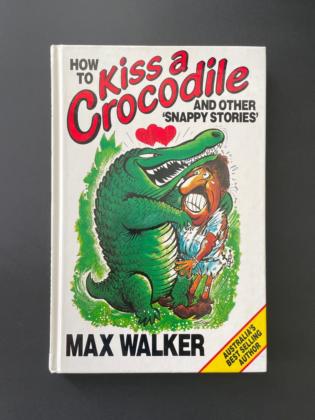 How to Kiss a Crocodile by Max Walker: photo of the front cover which shows very minor scuff marks.
