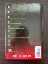 Load image into Gallery viewer, I Am Number Four by Pittacus Lore book: photo of back cover. There are very minor scuff marks along the edges of the dust jacket.
