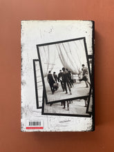 Load image into Gallery viewer, INXS-Story to Story by Anthony Bozza: photo of the back cover which shows very minor (barely noticeable) scuff marks along the edges of the dust jacket.
