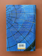 Load image into Gallery viewer, Lands of Glass by Alessandro Baricco: photo of the back cover which shows very minor (barely visible) scuff marks along the edges of the dust jacket.
