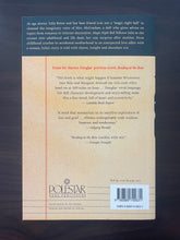 Load image into Gallery viewer, Magic Eight Ball by Marion Douglas book: photo of the back cover, which shows very minor scuff marks along the edges.
