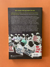 Load image into Gallery viewer, Mighty Be Our Powers by Leymah Gbowee: photo of the back cover which shows very minor (barely visible) scuff marks along the edges.
