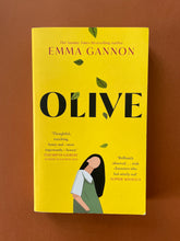 Load image into Gallery viewer, Olive by Emma Gannon: photo of the front cover which shows very minor (barely visible) scuff marks along the edges, and very minor scratching on the bottom-left corner.
