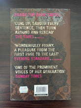 Load image into Gallery viewer, On Beauty by Zadie Smith book: photo of the back cover.
