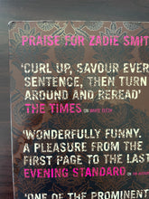 Load image into Gallery viewer, On Beauty by Zadie Smith book: photo of very minor scuff marks on the top-left corner of the back cover.
