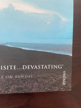Load image into Gallery viewer, On Chesil Beach by Ian McEwan book: photo of very minor (barely visible) scuff mark on the bottom-right corner of the front cover.
