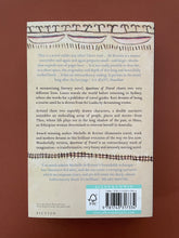 Load image into Gallery viewer, Questions of Travel by Michelle De Kretser: photo of the back cover.
