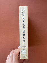 Load image into Gallery viewer, Religion and Morality by Gene Outka, &amp; John P. Reeder, Jr.: photo of the spine which still has a library tab sticky taped to it.
