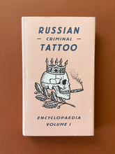 Load image into Gallery viewer, Russian Criminal Tattoo-Encyclopaedia Volume I: photo of the front cover which shows very minor scuff marks along the edges of the dust jacket.
