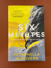 Load image into Gallery viewer, Six Minutes by Petronella McGovern: photo of the front cover which shows very minor (barely visible) scuff marks along the edges.

