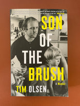 Load image into Gallery viewer, Son of the Brush by Tim Olsen: photo of the front cover which shows a very minor scuff mark on the bottom-right corner, which also makes the corner bend very slightly upwards.
