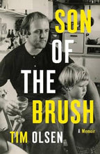Load image into Gallery viewer, Son of the Brush by Tim Olsen: stock image of front cover; black and white photograph of a man sitting on a chair in a kitchen. His legs are crossed, he has a glass of white wine in his right hand, and his left arm is draped over the left shoulder of a little boy standing against his legs. The little boy is topless and the man&#39;s left hand is sitting on his belly.  The words SON OF THE BRUSH A MEMOIR TIM OLSEN are written down and across the page in large and small white and yellow lettering. 
