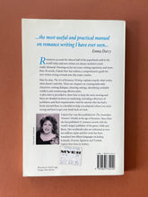 Load image into Gallery viewer, The Art of Romance Writing by Valerie Parv: photo of the back cover which shows minor scuff marks and creasing along the edges.
