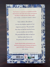Load image into Gallery viewer, The Dutch House by Ann Patchett book: photo of back cover, which has very minor (barely visible) scuff marks along the edges.
