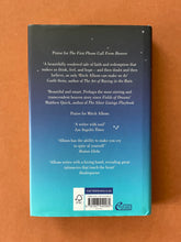 Load image into Gallery viewer, The First Phone Call From Heaven by Mitch Albom: photo of the back cover which shows very minor scuff marks along the edges of the dust jacket.
