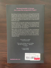 Load image into Gallery viewer, The Godmother by Hannelore Cayre book: photo of the back cover, which shows the top-left corner curving upwards very slightly.
