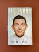 Load image into Gallery viewer, The Life of Lee by Lee Evans: photo of the front cover which shows very minor scuff marks along the edges of the dust jacket.
