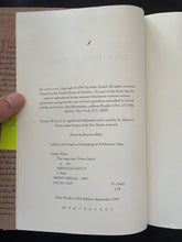 Load image into Gallery viewer, The Long Rain by Peter Gadol book: photo of the title page. There is a very small black smudge visible at the top of the page.
