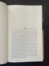 Load image into Gallery viewer, The Long Rain by Peter Gadol book: photo of the very minor crease running down the middle of the page. Barely noticeable here, and even less so on the following pages.
