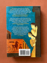 Load image into Gallery viewer, The Pericles Commission by Gary Corby: photo of the back cover which shows very minor (barely visible) scuff marks along the edges of the dust jacket.
