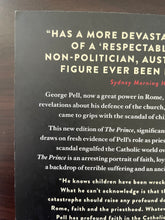 Load image into Gallery viewer, The Prince by David Marr book: photo of very minor scuff mark on the top-left corner of the back cover.
