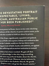 Load image into Gallery viewer, The Prince by David Marr book: photo of very minor scuff mark on the top-right corner of the back cover.
