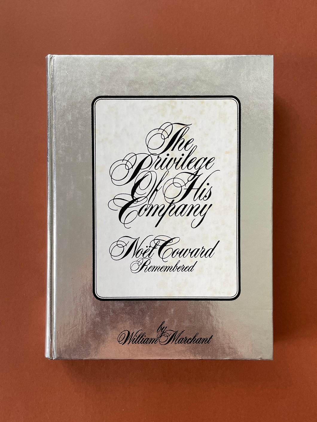 The Privilege of His Company-Noel Coward Remembered by William Marchant: photo of the front cover which shows very minor scuff marks, and faint but obvious discolouring on the white part of the cover.