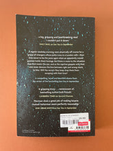 Load image into Gallery viewer, The Secrets of Strangers by Charity Norman: photo of the back cover which shows very minor scuff marks along the edges.
