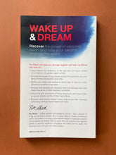 Load image into Gallery viewer, Wake up and Dream by Pat Mesiti: photo of the back cover which shows obvious creasing on the top-left corner.
