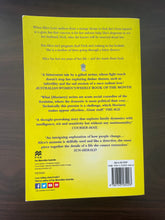 Load image into Gallery viewer, What Alice Forgot by Liane Moriarty book: photo of the back cover. There is a minor scuff mark on the bottom corner and both the top and bottom corners curve upwards very slightly.
