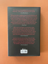 Load image into Gallery viewer, Working Class Man by Jimmy Barnes: photo of the back cover which shows very minor scuff marks along the edges of the dust jacket.
